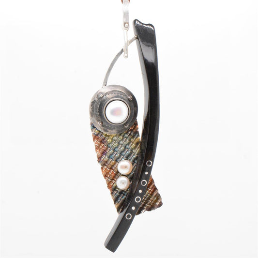 925 Silver With a Rainbow Patina Accented with Pearls and White Buffalo Pendant