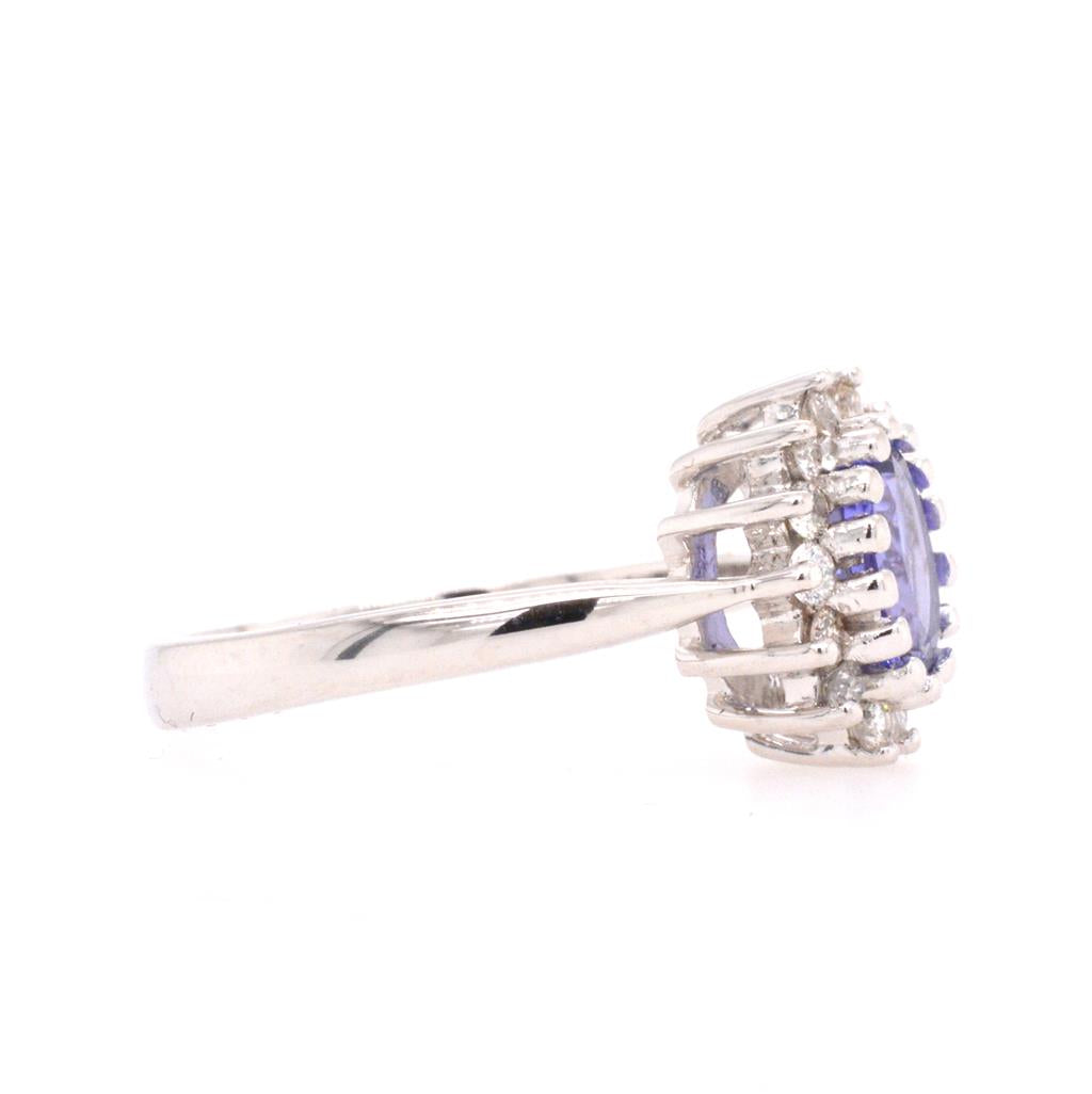 White 14 Karat Tanzanite Ring Accented with Diamonds
