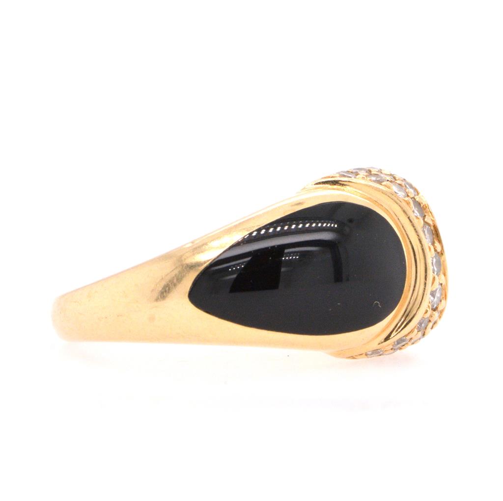 Estate Yellow14 Karat Ring with Black Onyx Bezel Set Stones and Accented with Diamonds